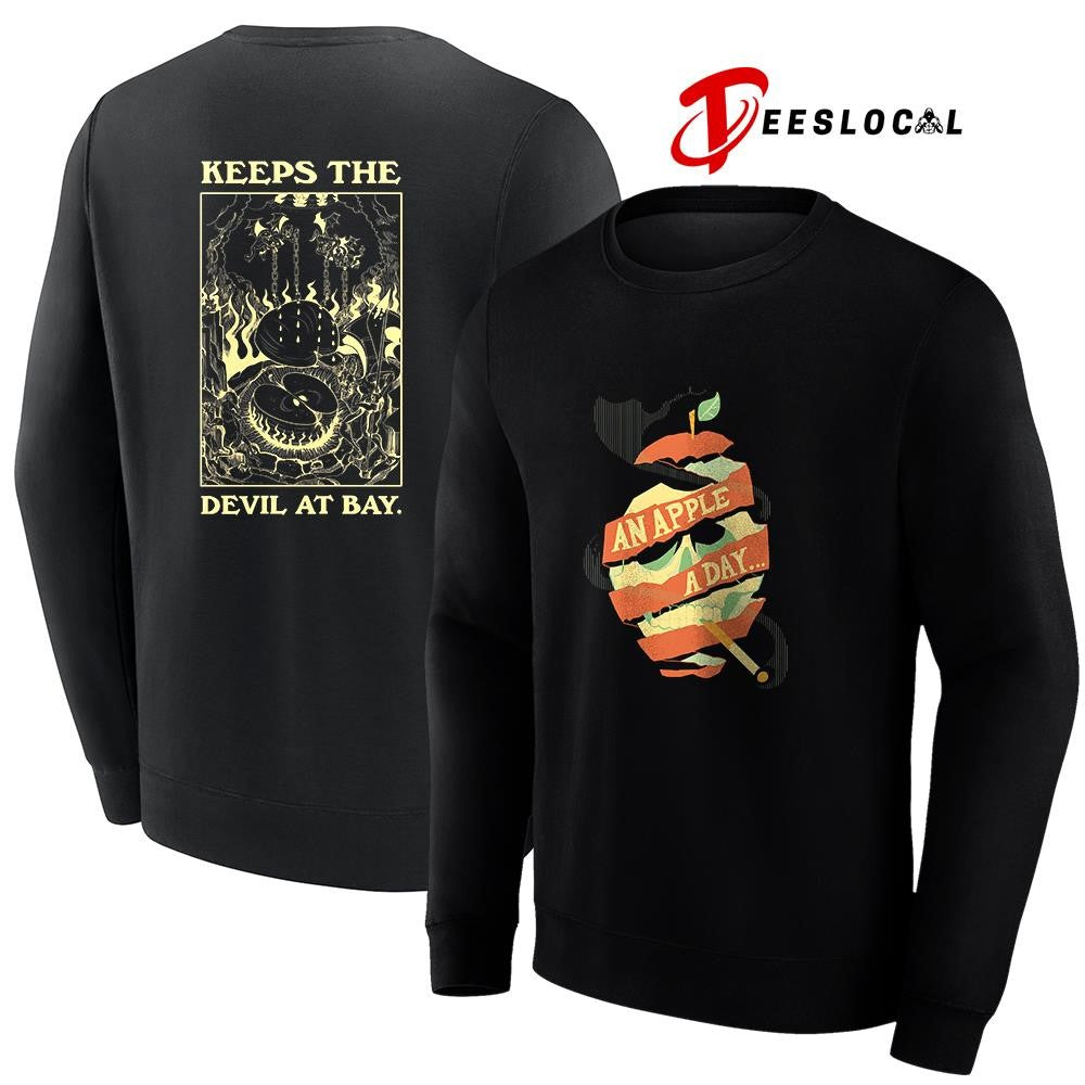 An apple a day keeps the devil at Bay graphic shirt