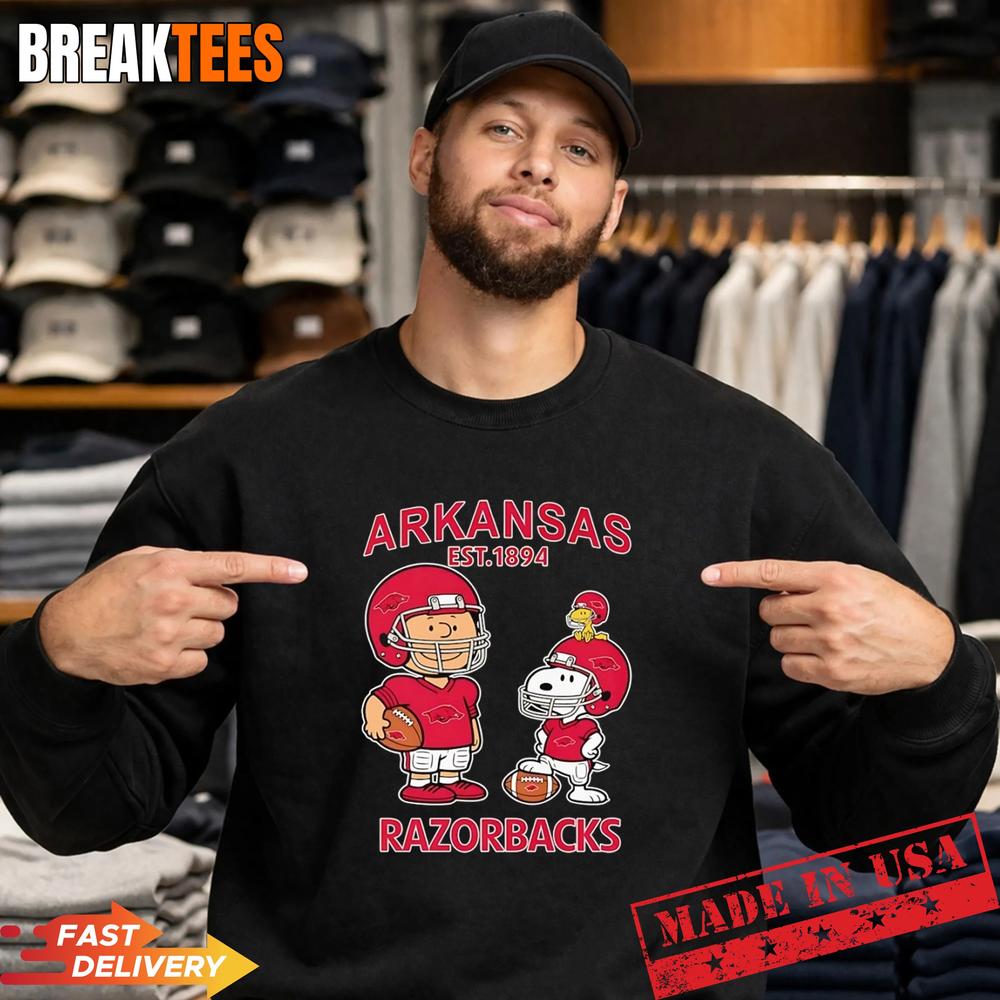 Charlie Brown Snoopy and Woodstock wearing Arkansas Razorbacks jersey NFL est 1894 T-Shirt