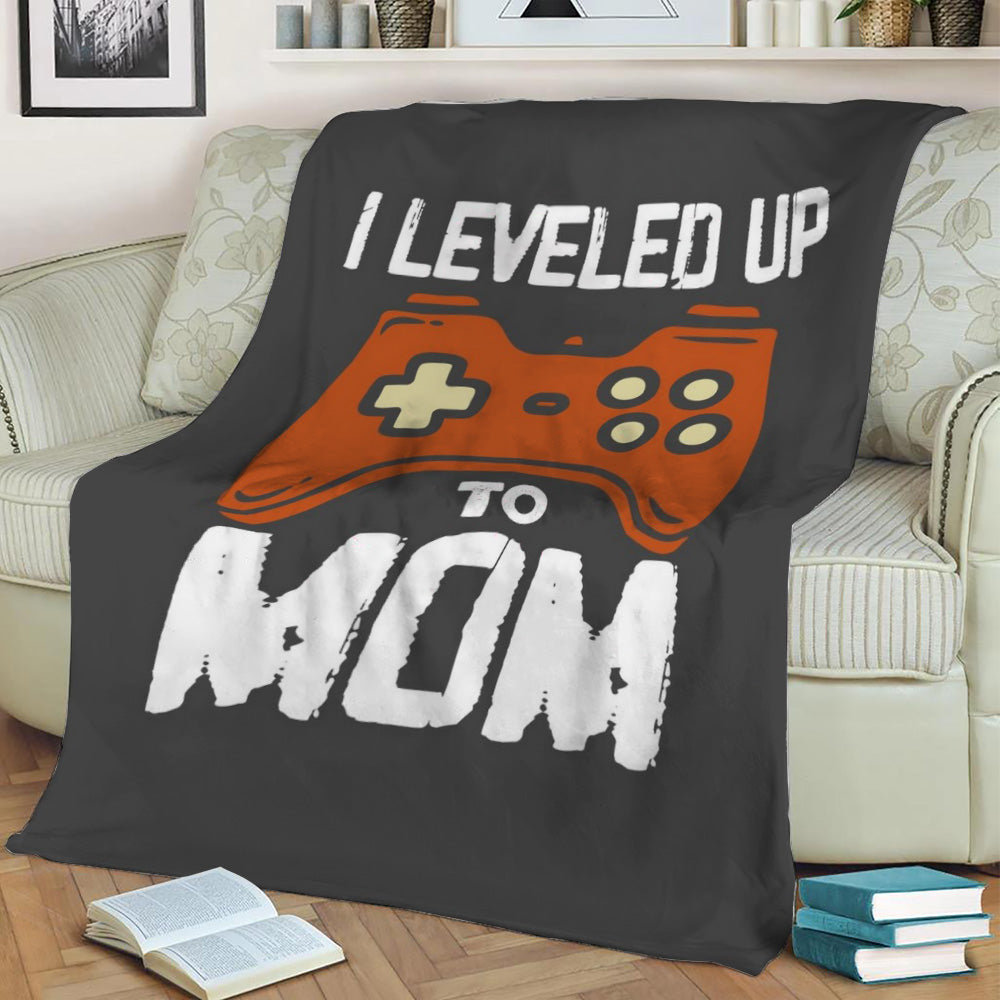 I leveled up to mom Fleece Throw Blanket