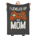 I leveled up to mom Fleece Throw Blanket