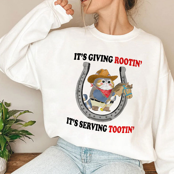 Cowboy Cat It’s Giving Rootin’ It’s Serving Tootin’ T Shirt