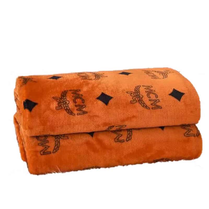 brown dog sofa blankets